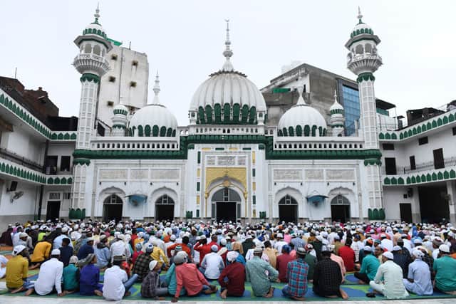 Muslim devotees gather for prayers during the Muslim festival Eid al-Adha or the 'Festival of Sacrifice, at Jama Masjid Khairuddin in Amritsar on July 21, 2021