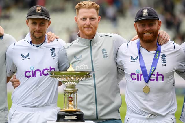 England's Joe Root, Ben Stokes and Jonny Bairstow pose for a photo with the series trophy after  Day Five of the Fifth LV=Insurance Test Match