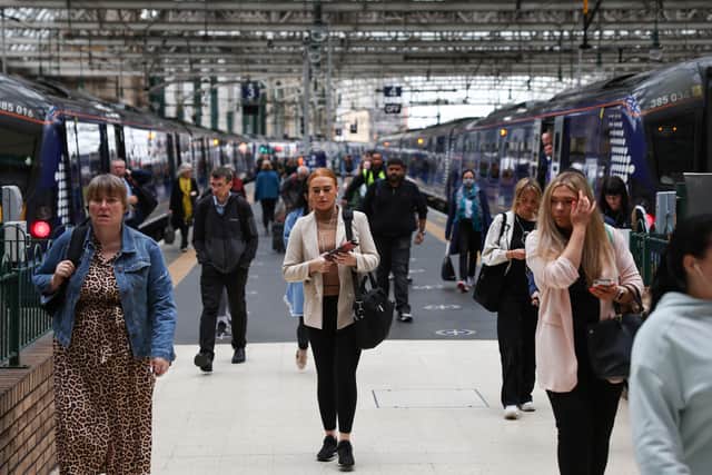 Commuters leaving their train at Central Station in Glasgow, Scotland (Pic: Getty Images)