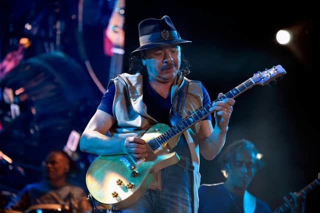 Guitarist Carlos Santana has collapsed on stage during an open-air concert in the United States.