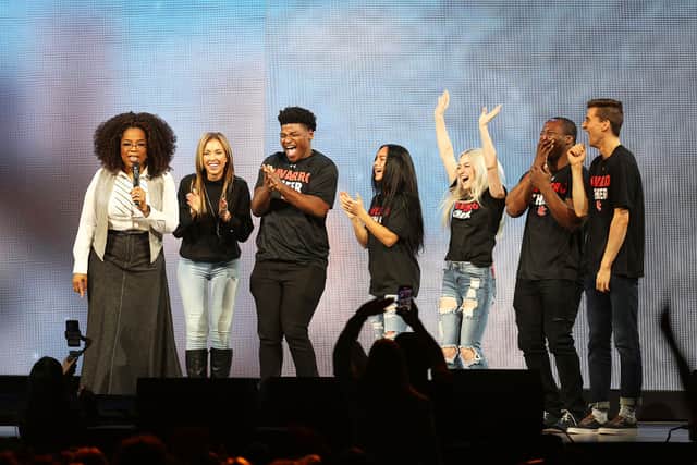  Oprah Winfrey speaks with the cast of Netflix’s “Cheer”, (L-R) Monica Aldama, Jerry Harris, Gabi Butler, Lexi Brumback, TT Barker and Dillon Brandt during Oprah’s 2020 Vision: Your Life in Focus Tour presented by WW (Weight Watchers Reimagined) at American Airlines Center on February 15, 2020 in Dallas, Texas. (Photo by Omar Vega/Getty Images)