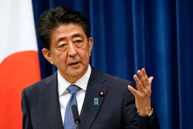 Shinzo Abe speaks during a press conference announcing his resignation due to health concerns. (Photo by Franck Robichon - Pool/Getty Images)