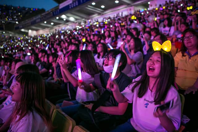South Korean K-Pop fans. (Photo by Jean Chung/Getty Images)