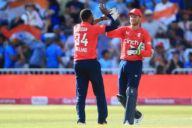 Buttler celebrates with Chris Jordan after winning third T20 against India