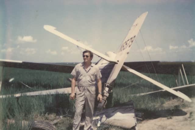 Gary Betzner with a crashed plane