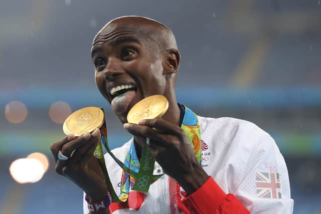 Sir Mo Farah celebrates with his gold medals after winning the Men’s 5000m and 10,000m at the Olympic Stadium on the fifteenth day of the Rio Olympic Games, Brazil (Photo: PA/Martin Rickett)