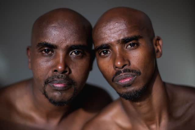 Sir Mo Farah poses with his twin brother Hassan on July 18, 2019 in Weybridge, England as part of a series following Mo Farah behind the scenes in his journey towards the Tokyo Olympics (Photo by Michael Steele/Getty Images)
