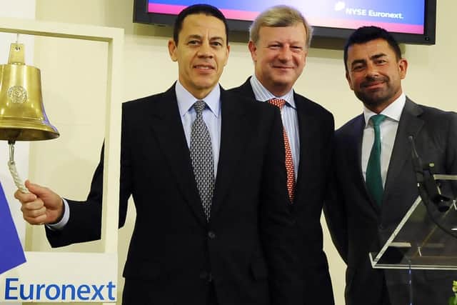 Mark MacGann (right) during the opening bell ceremony at Euronext Brussels stock exchange in 2011 (Photo: BENOIT DOPPAGNE/AFP via Getty Images)