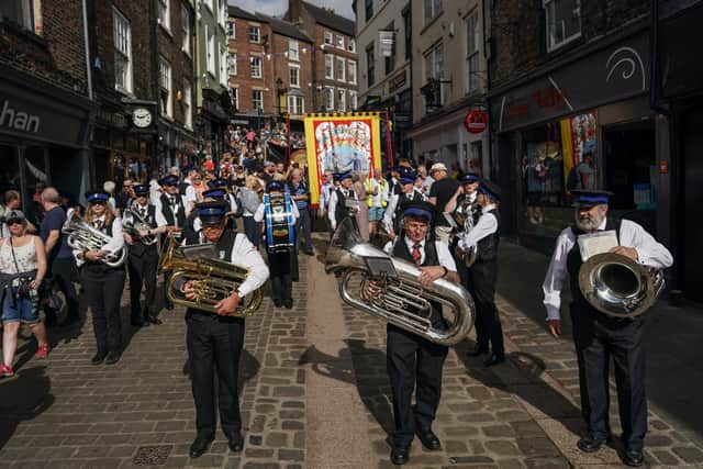  Musicians from colliery bands perform as they march through the city during the 136th Durham Miners Gala on July 09, 2022 in Durham, England