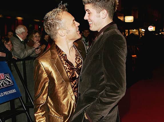 Graham Norton and Kristain Seeber at the London Premiere and Press Night for the new stage musical adaptation of “Mary Poppins” at the Prince Edward Theatre on December 15, 2004 in London. (Photo by MJ Kim/Getty Images)