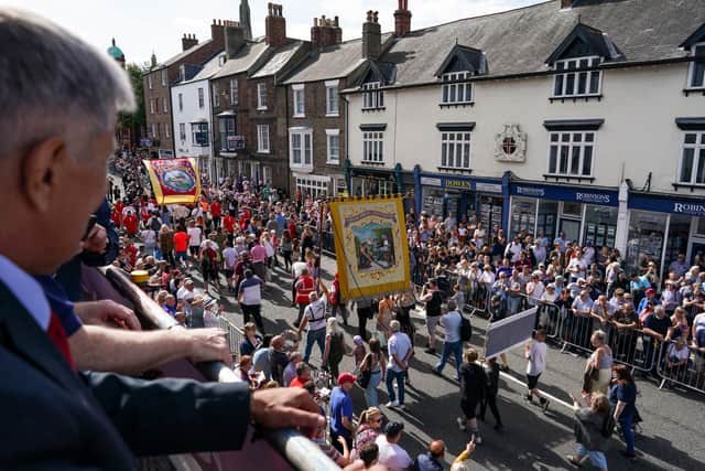 Colliery banners are carried through the city  on July 09, 2022 in Durham, England