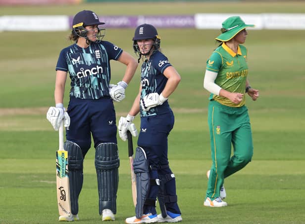 <p>Nat Sciver, left, and Emma Lamb look on as they score 55 and 102 respectively</p>
