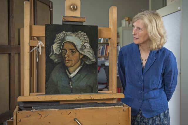 Senior Curator Frances Fowle with Head of a Peasant Woman (1885) by Vincent Van Gogh (Photo: PA/National Galleries of Scotland)