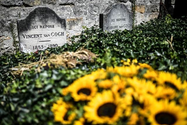 The graves of Dutch painter Vincent Van Gogh (L) and his brother Theo Van Gogh at the cemetery of Auvers-sur-Oise (Photo by STEPHANE DE SAKUTIN/AFP via Getty Images)
