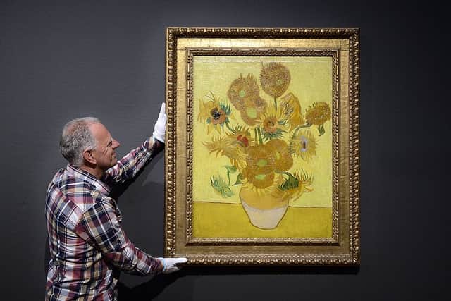 The famous painting Sunflowers of painter Vincent Van Gogh at the Van Gogh museum in Amsterdam, The Netherland (Photo by LEX VAN LIESHOUT/AFP via Getty Images)