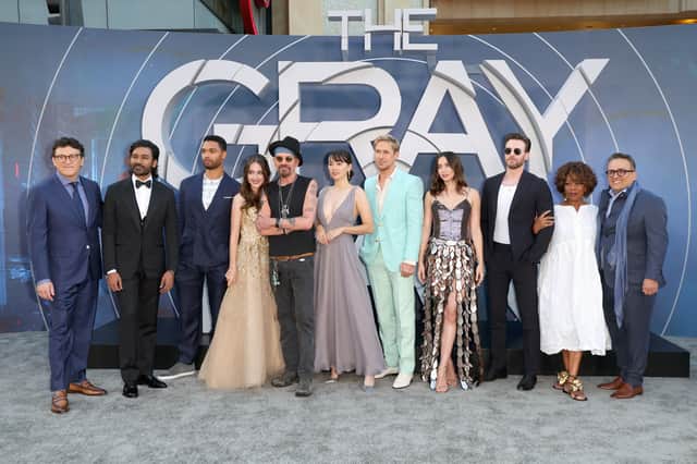  (L-R) Anthony Russo, Dhanush, RegÃ©-Jean Page, Julia Butters, Billy Bob Thornton, Jessica Henwick, Ryan Gosling, Ana de Armas, Chris Evans, Alfre Woodard, and Joe Russo  (Pic: Getty Images for Netflix)