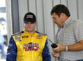 SPARTA, KY - JULY 7:  Bobby East, driver of the #21 State Fair Corn Dogs/Edy's Dibs Ford, talks with former series driver Robert Pressley during the NASCAR Craftsman Truck Series Built Ford Tough 225 practice on July 7, 2006 at the Kentucky Speedway in Sparta, Kentucky. (Photo by Joe Robbins/Getty Images for NASCAR)