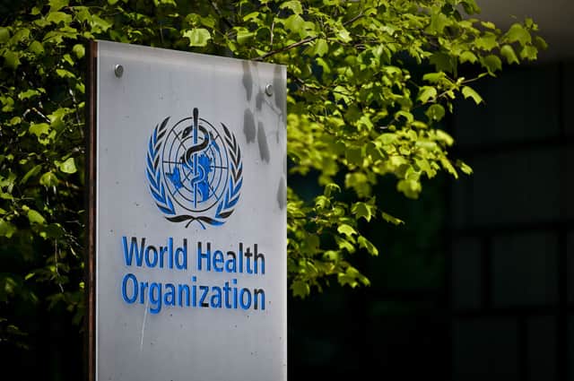 The World Health Organization (WHO) at the entrance of their headquarters in Geneva (Photo by FABRICE COFFRINI/AFP via Getty Images)
