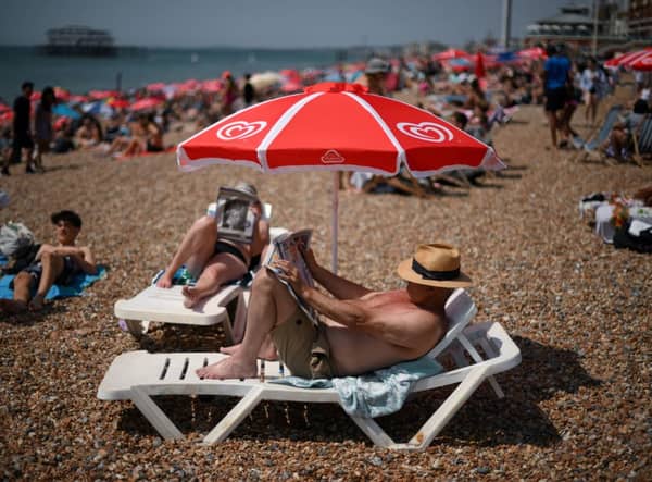 The UK has recorded its highest ever temperature today amid a record heatwave (image: AFP/Getty Images)