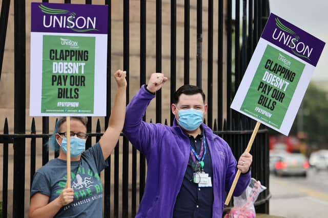 NHS nurses stage a protest after being left out of a public sector pay rise in August 2020 (Photo by Jeff J Mitchell/Getty Images)