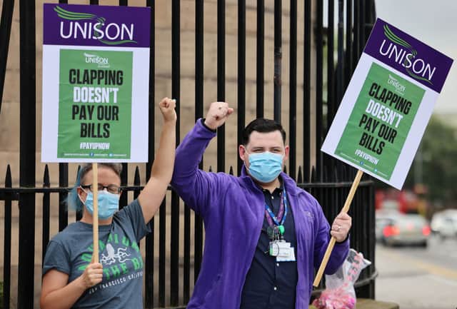 NHS nurses stage a protest after being left out of a public sector pay rise in August 2020 (Photo by Jeff J Mitchell/Getty Images)