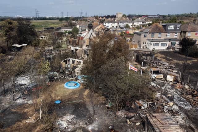 An aerial view shows the rubble and destruction in a residential area following a large blaze the previous day, on July 20, 2022 in Wennington, Greater London (Photo by Leon Neal/Getty Images)