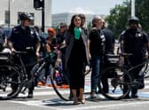 US Representative Alexandria Ocasio-Cortez is detained after participating in a sit in with activists from Center for Popular Democracy (Pic: Getty Images)