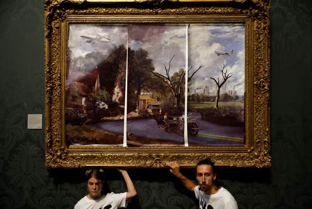 A demonstration was held in the National Gallery, with members gluing themselves to the artwork ‘The Hay wain by John Constable. (Credit: Getty Images)