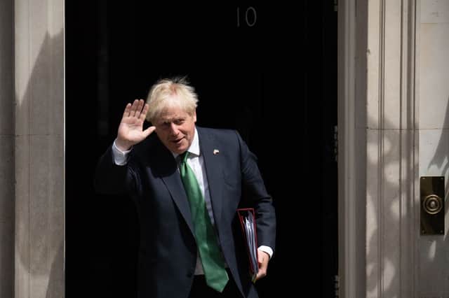 Britain’s outgoing Prime Minister, Boris Johnson, leaves 10 Downing Street to attend Prime Minister’s Questions in the House of Commons  (Photo by Carl Court/Getty Images)