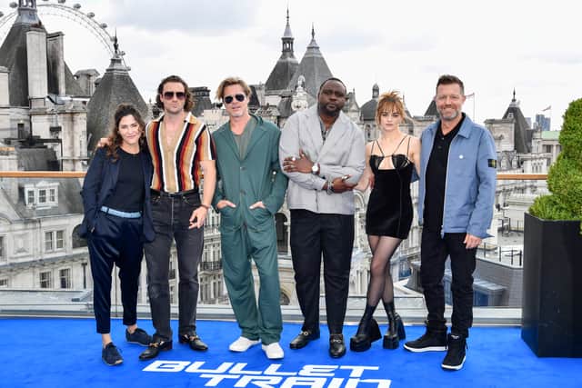 Kelly McCormick, Aaron Taylor-Johnson, Brad Pitt, Brian Tyree Henry, Joey King and David Leitch attend the “Bullet Train” Photocall at The Corinthia Hotel in London (Pic: Gareth Cattermole/Getty Images)