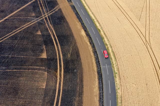 <p>An aerial view of charred fields after a crop fire near the village of Dinnington on July 20, 2022 in Rotherham (Getty Images)</p>