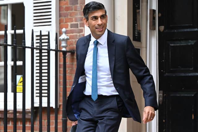 The label of Rishi Sunak’s suit was visible, indicating that he had spent around £3,500 on the outfit. (Credit: Getty Images)