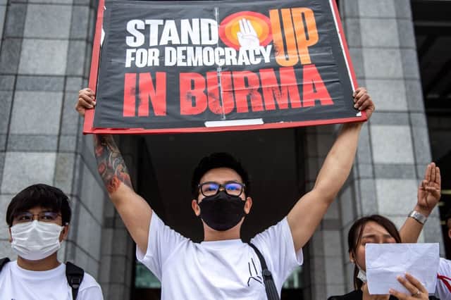 Activists including Myanmar nationals take part in a rally to protest against Myanmar’s junta execution of four prisoners (Photo by PHILIP FONG/AFP via Getty Images)