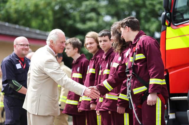 Prince Charles recently met with firefighters at Morecambe Fire Station to mark 21 years of Lancashire Fire and Rescue Service