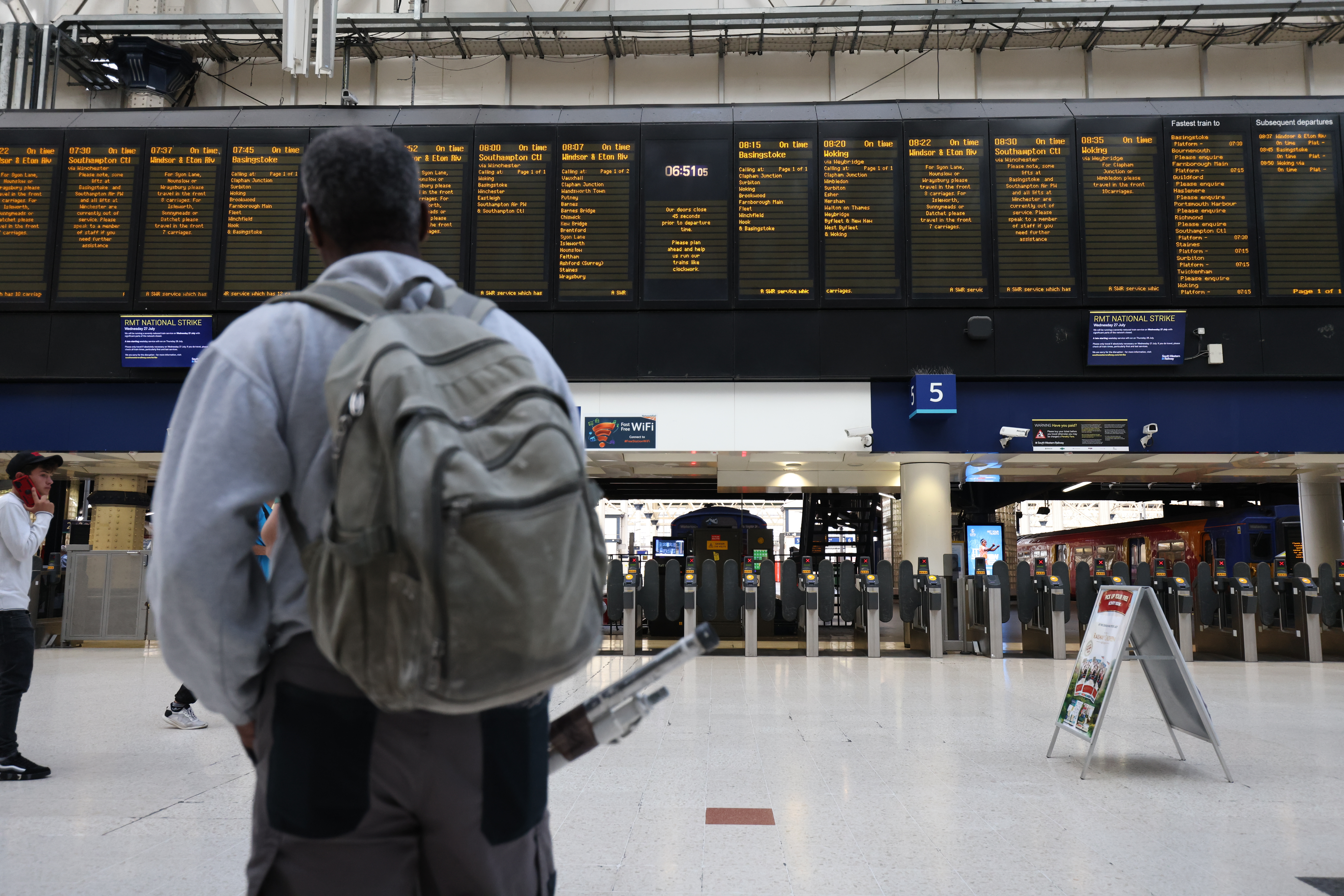 Train strikes 2022: UK rail passengers set for day of disruption as workers walk out in row over jobs and pay