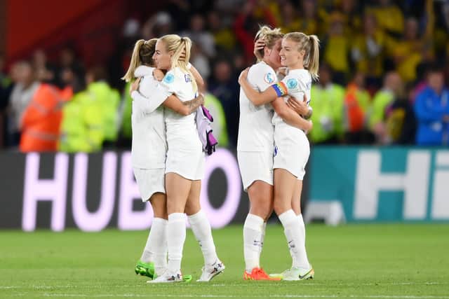 England women celebrate their win over Sweden 