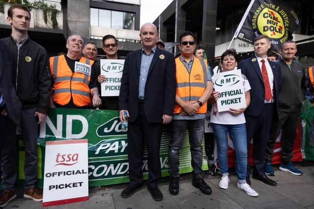 A picket line is joined by Mick Lynch, Secretary-General of the National Union of Rail, Maritime and Transport Workers (Photo by Dan Kitwood/Getty Images)