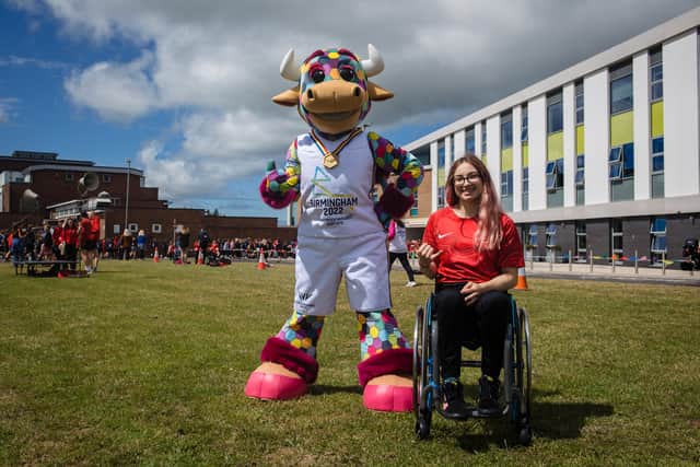 Perry the Ball with para swimmer Lily Rice during Queen’s Baton Relay 