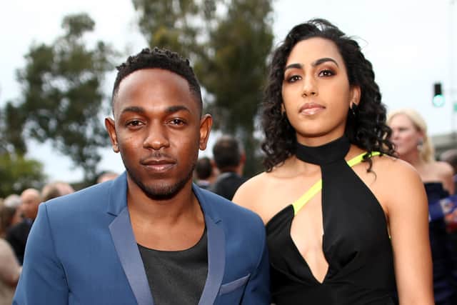  Rapper Kendrick Lamar (L) and Whitney Alford attend the 56th GRAMMY Awards at Staples Center on January 26, 2014 in Los Angeles, California.  (Photo by Christopher Polk/Getty Images for NARAS)
