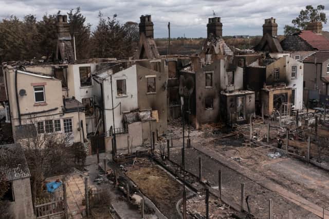  Homes gutted by fire on July 25, 2022 in Wennington, Greater London (Photo by Dan Kitwood/Getty Images)