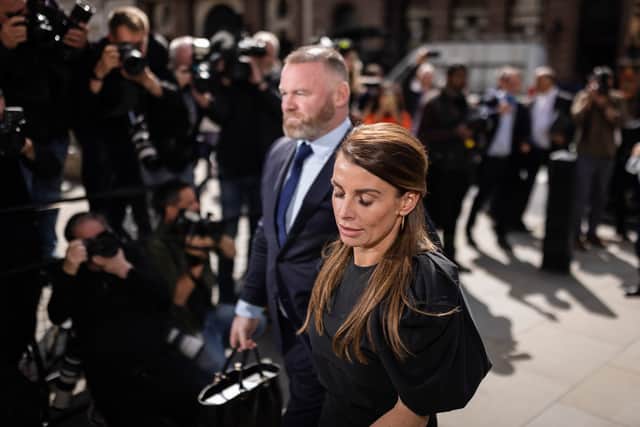 Coleen Rooney arrives with husband Wayne Rooney at Royal Courts of Justice, Strand on May 12, 2022.