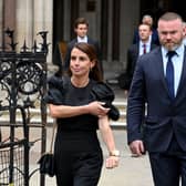 Coleen Rooney departs with husband Wayne Rooney at Royal Courts of Justice, Strand on May 12, 2022 .