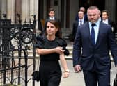 Coleen Rooney departs with husband Wayne Rooney at Royal Courts of Justice, Strand on May 12, 2022 .