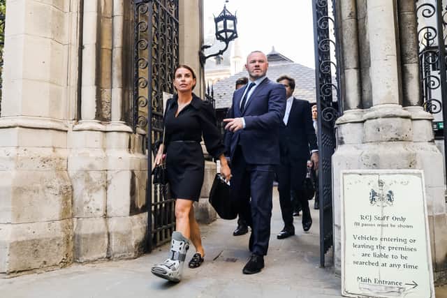 Coleen Rooney and Wayne Rooney leave the Royal Courts of Justice, Strand on May 17, 2020.