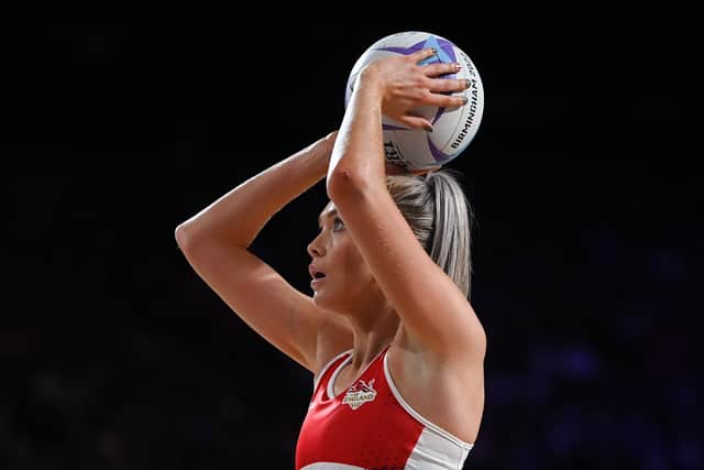 BIRMINGHAM, ENGLAND - JULY 30: Helen Housby of Team England shoots during the Netball Pool B match between Team England and Team Malawi on day two of the Birmingham 2022 Commonwealth Games at NEC Arena on July 30, 2022 on the Birmingham, England. (Photo by David Ramos/Getty Images)