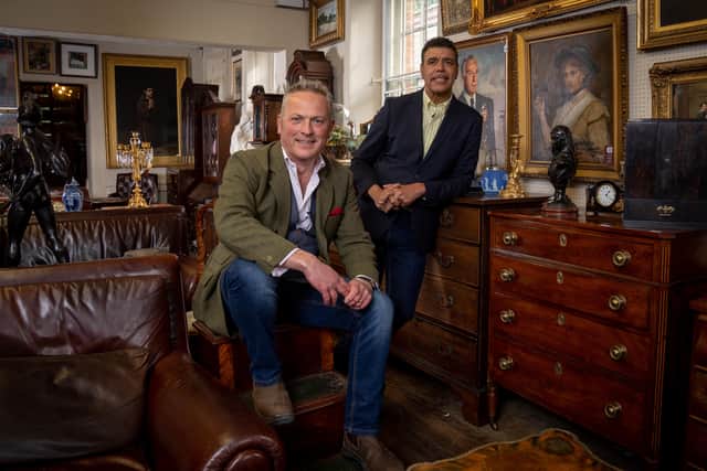 Chris Kamara and expert appraiser Paul Hayes in the new series of Cahs in the Attic on Channel 5.
