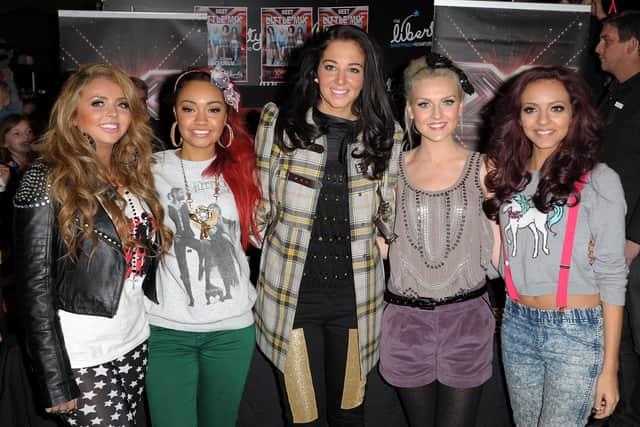 Jesy Nelson, Leigh-Anne Pinnock, Perrie Edwards and Jade Thirlwall of Little Mix and Tulisa Contostavlos attend a special gig ahead of this weekend's X Factor final at The Liberty on December 5, 2011 in Romford, England.  (Photo by Ben Pruchnie/Getty Images)