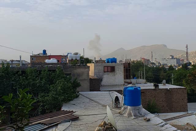 Smoke rises from a house following a US drone strike in the Afghan capital of Kabul (Pic: AFP via Getty Images)