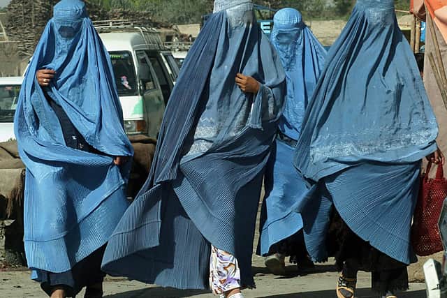 A group of Afghan women walk towards a market in Ghazni (Pic: Images)