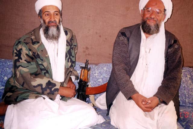 Osama bin Laden (L) sits with Ayman al-Zawahiri in an interview in 2001 (Pic: Getty Images)